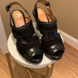 Nurture heels with suede, patent and metal detail. Size 10 M